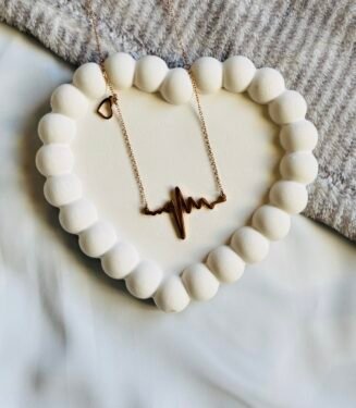 Heartbeat Rhythm With Heart Shaped Necklace